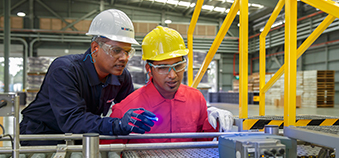 Engineer Inspecting Machinery