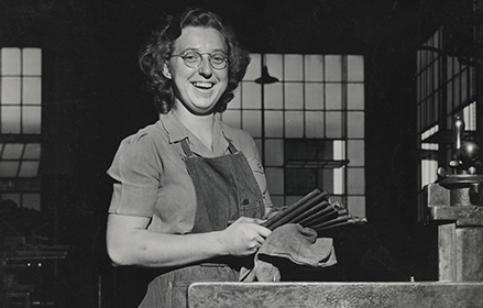 a black and white image of a women scientist
